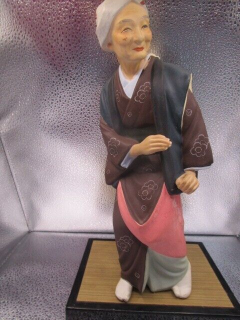 Vintage Hakata Urasaki old lady Clay Figurine 11 1/2" in ratan base