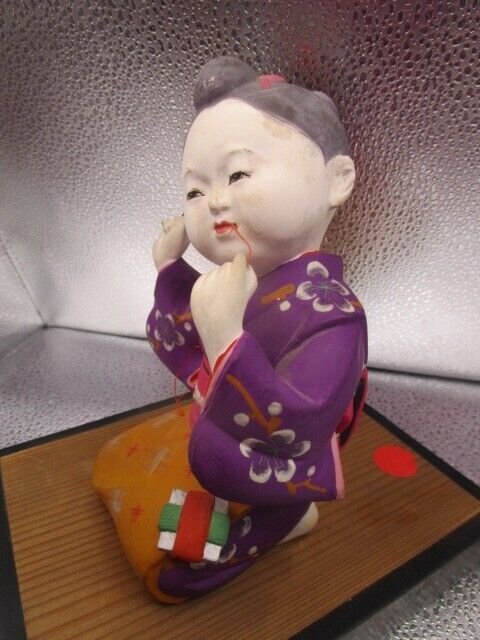 Vintage Hakata Urasaki sewing girl Clay Figurine 9 x 9 x 6" in ratan base